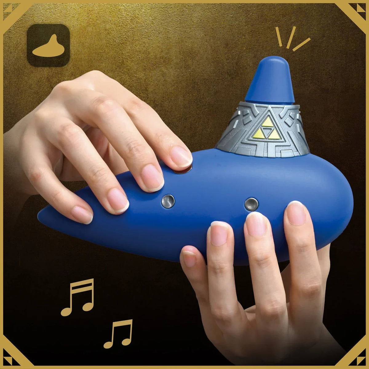 Hands holding and playing the blue Hori electric ocarina with floating music icons