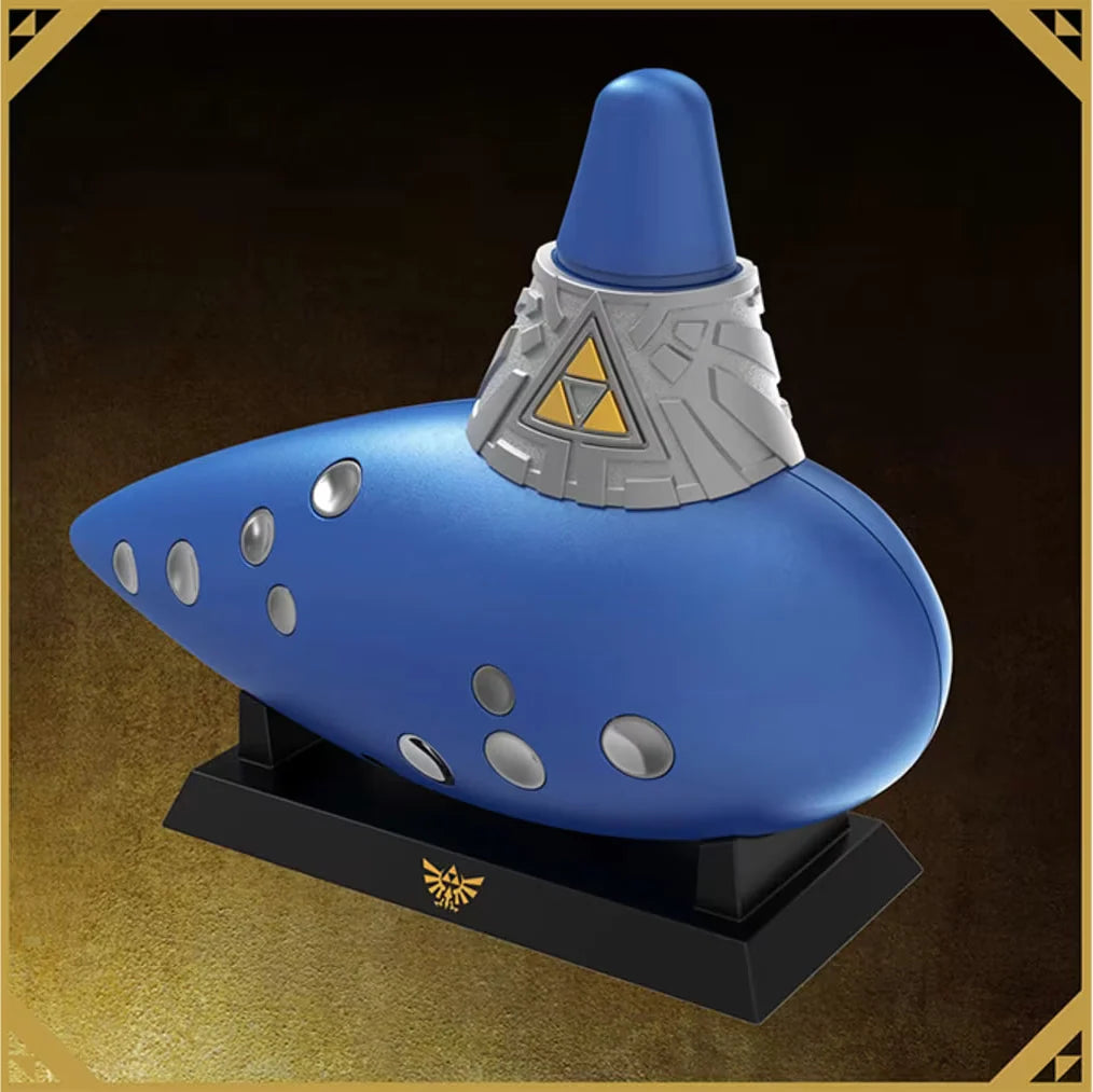 Blue Hori electric ocarina resting on branded display stand against textured background
