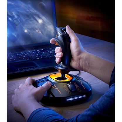 User operating black Thrustmaster T.16000M FCS joystick with both hands in gaming setup